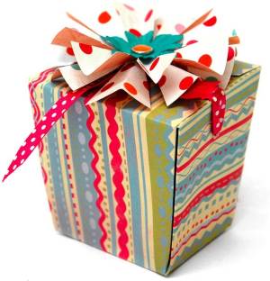 Як упакувати подарунок у подарунковий папір: красиво, правильно, оригінально