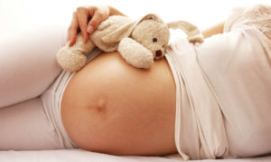 Болить пупок при вагітності внизу праворуч або збоку, віддаючи в спину   це нормально чи ні? Причини болю, що робити, якщо вона різка, ниючий або спазматична